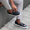 Men’s tassel slip-on sneaker in black leather