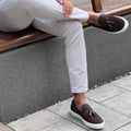 Men’s tassel slip-on sneaker in brown suede